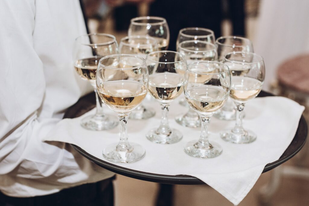 glasses of champagne or wine on tray